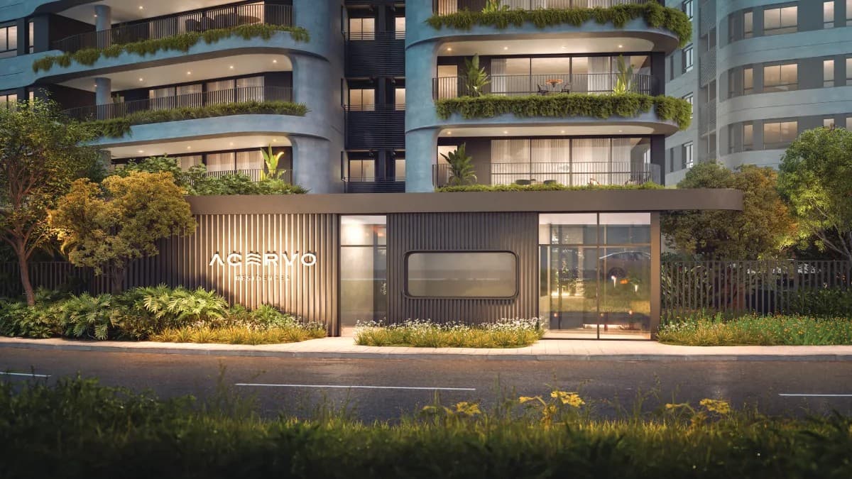 Entrada do Acervo Residences Alphaville ao anoitecer